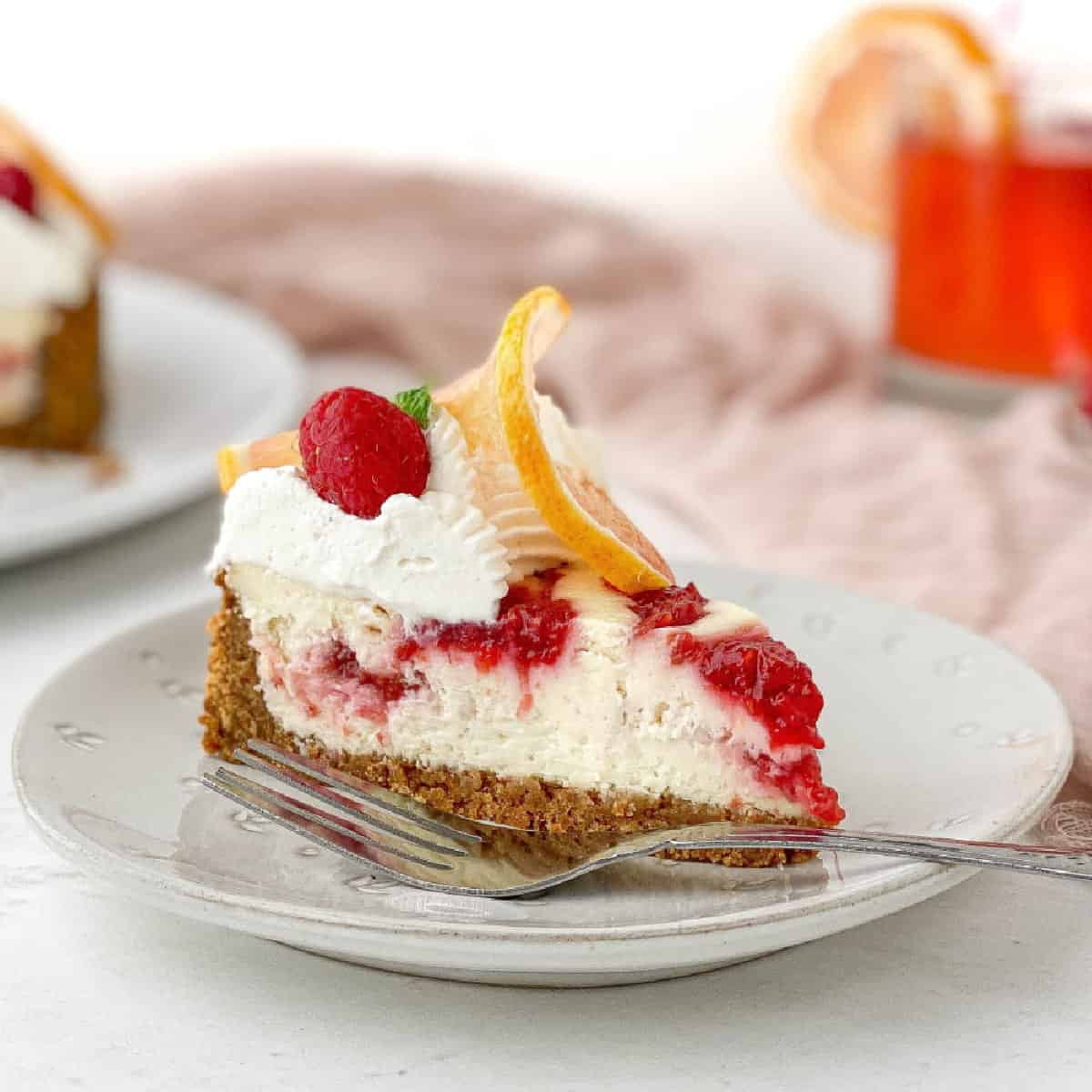 Slice of Raspberry Lemonade Cheesecake.