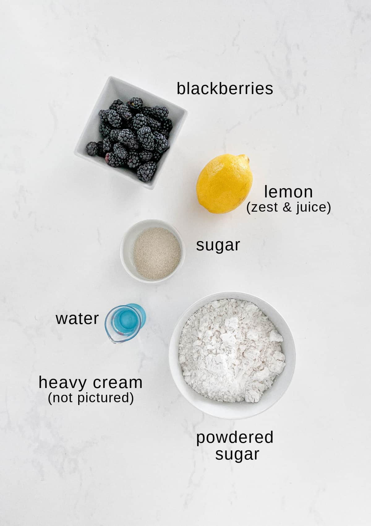 Blackberry glaze ingredients on a white background.