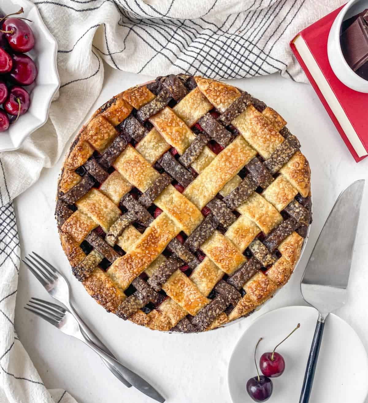 Top view of whole Chocolate Cherry Pie with two-tone lattice top.