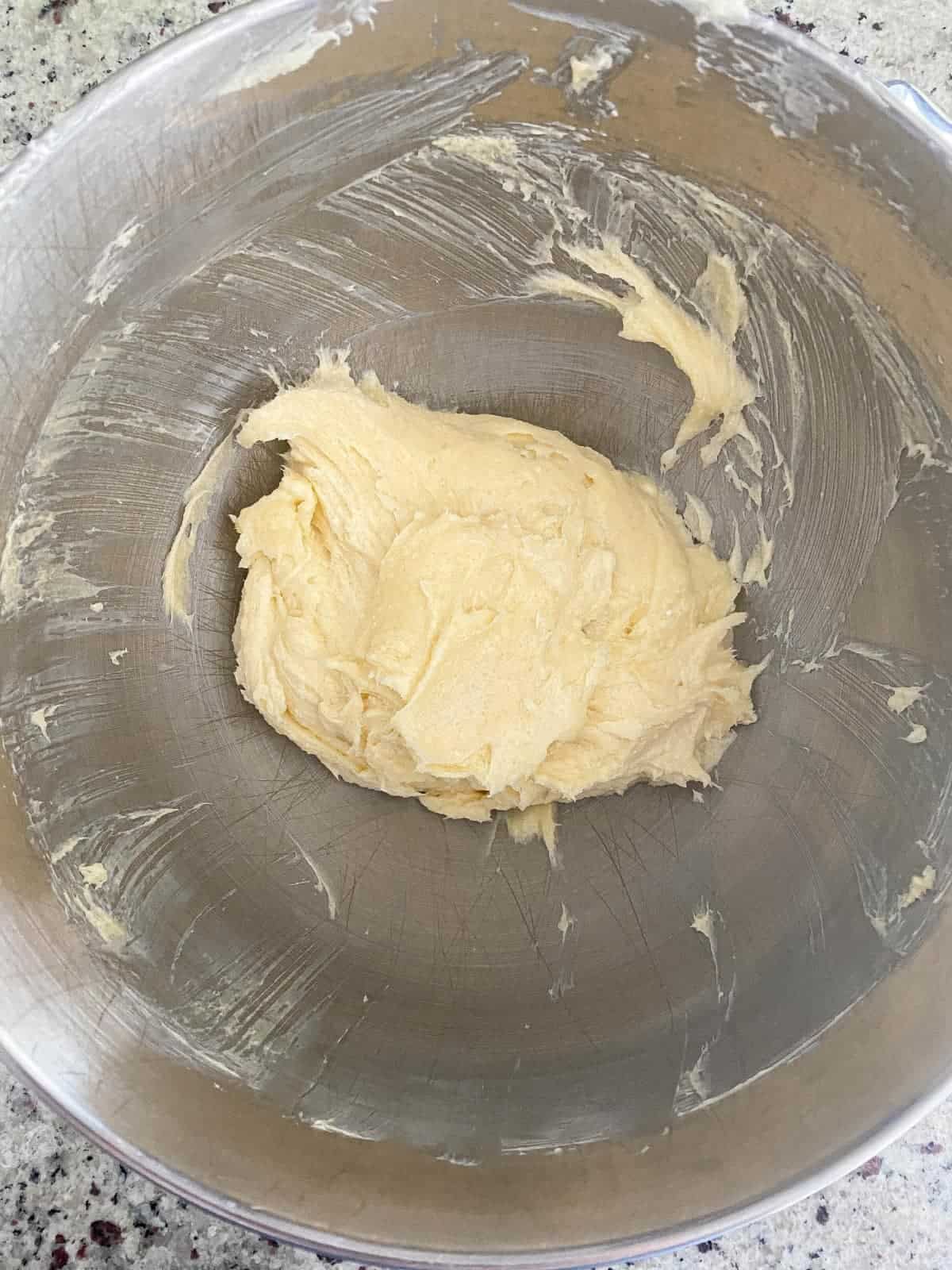 Making cream cheese sugar cookies, step one.