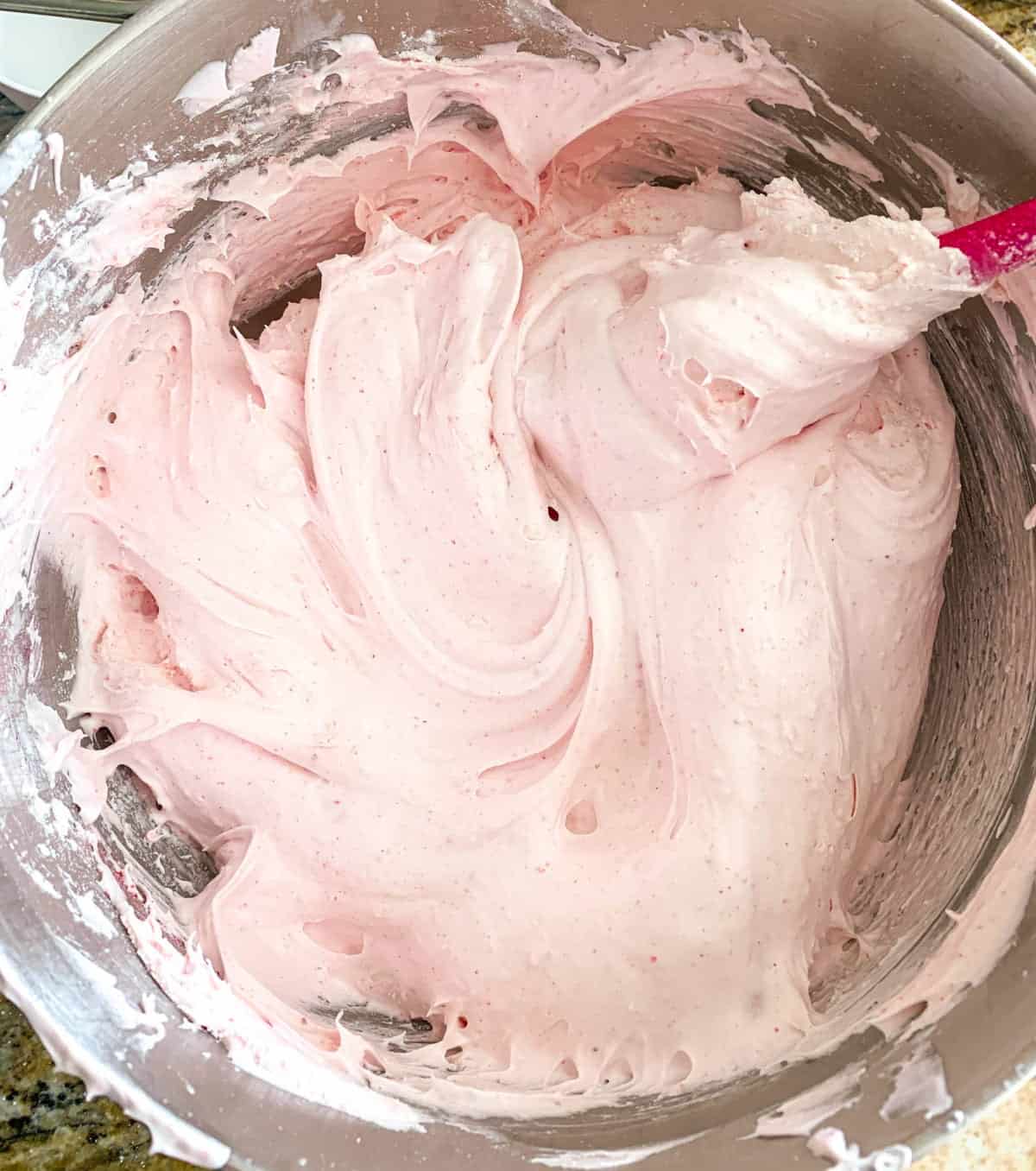 Closeup of pink Strawberry Angel Food Cake batter.
