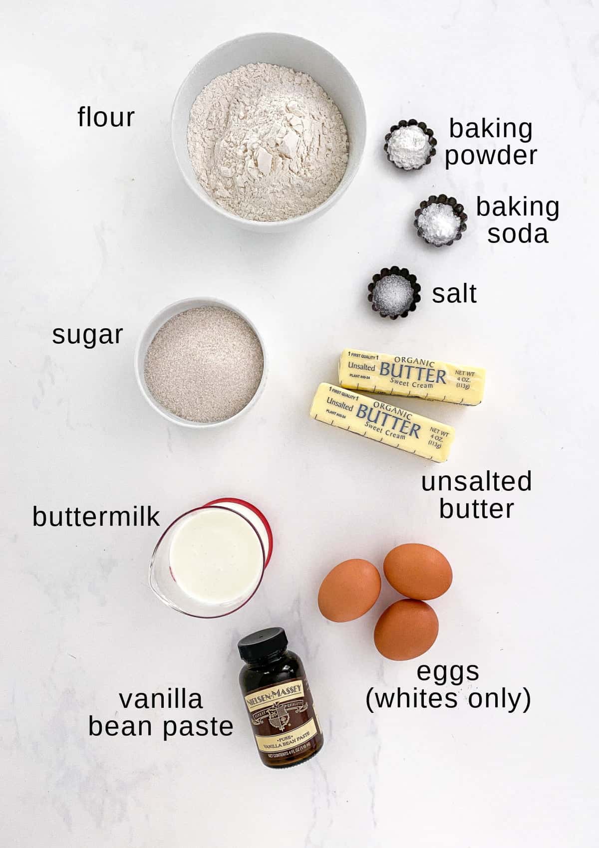 Vanilla bean cupcake ingredients on a white background.