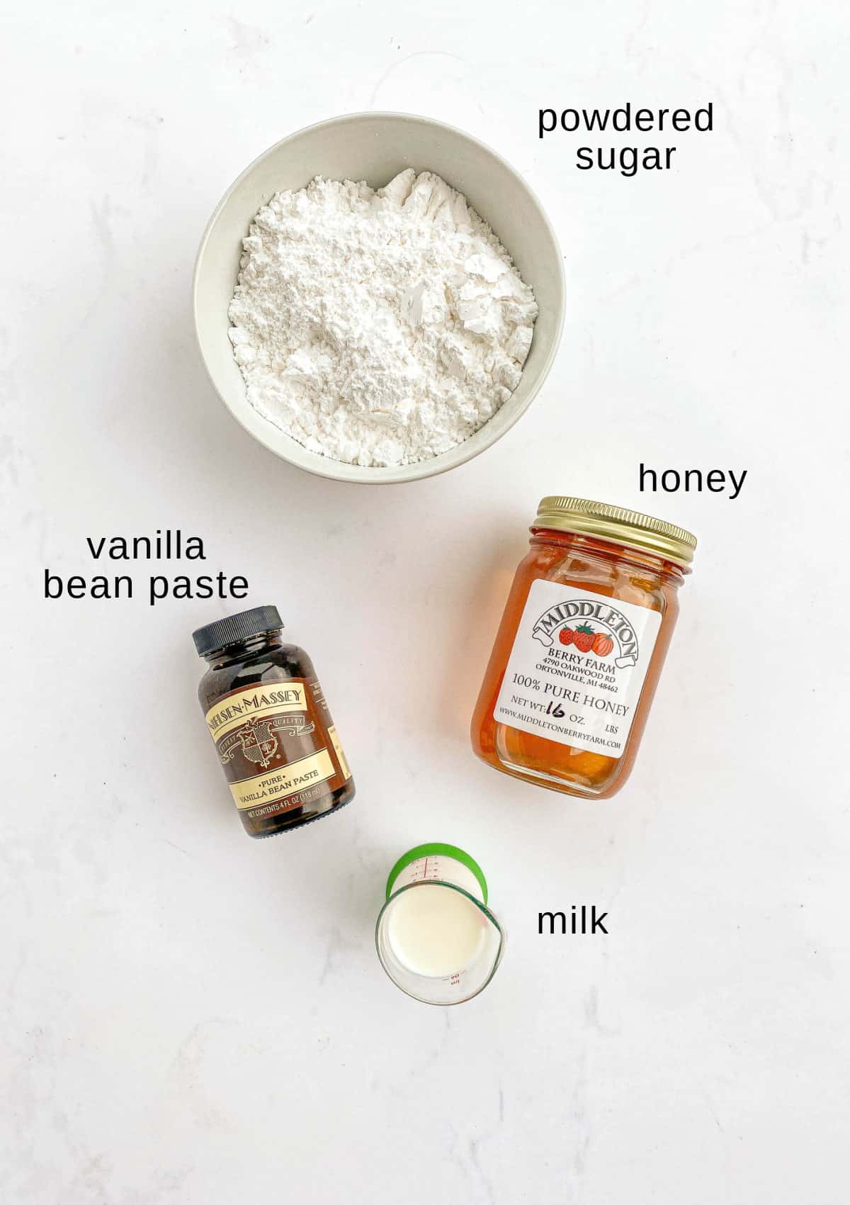 Vanilla honey glaze ingredients on a white background.