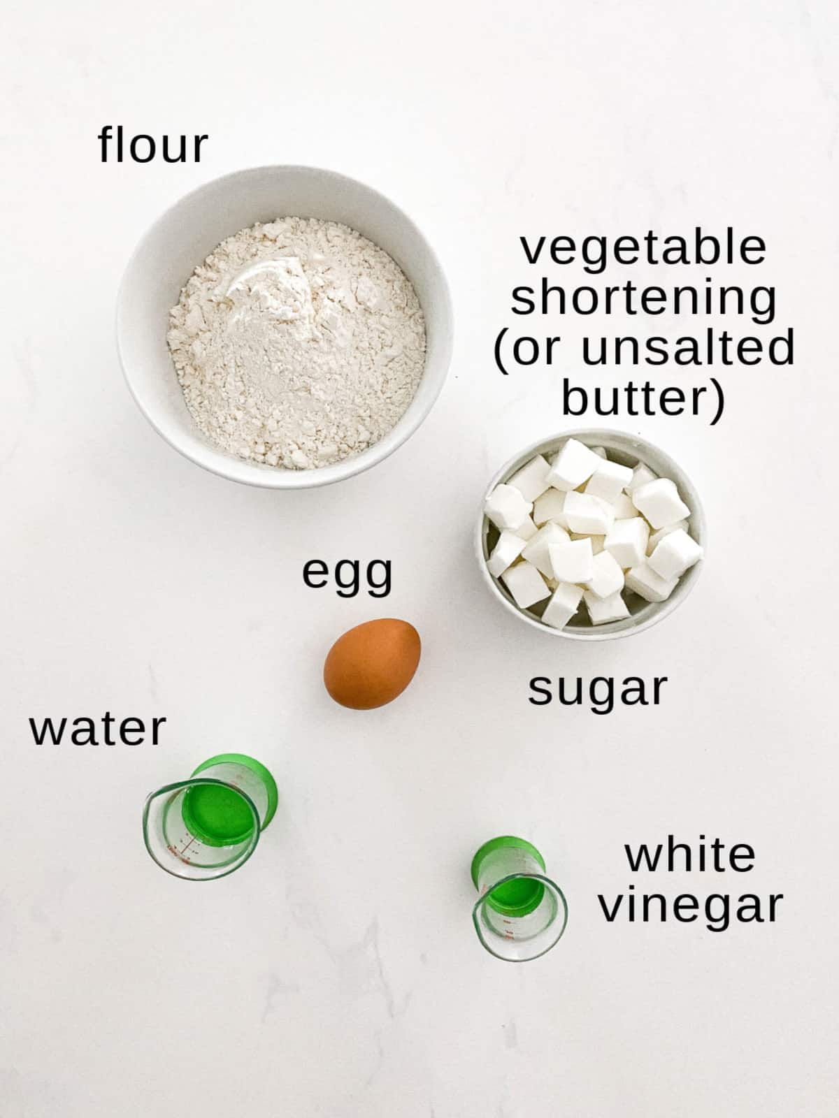 Pie crust ingredients on a white background.