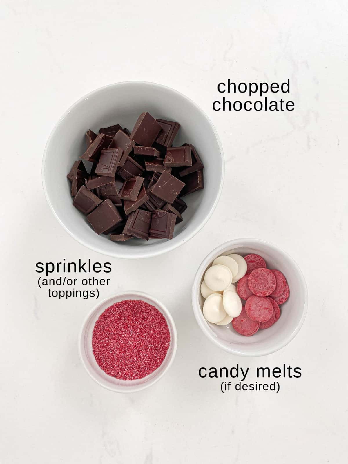 Chocolate bark ingredients on a white background.