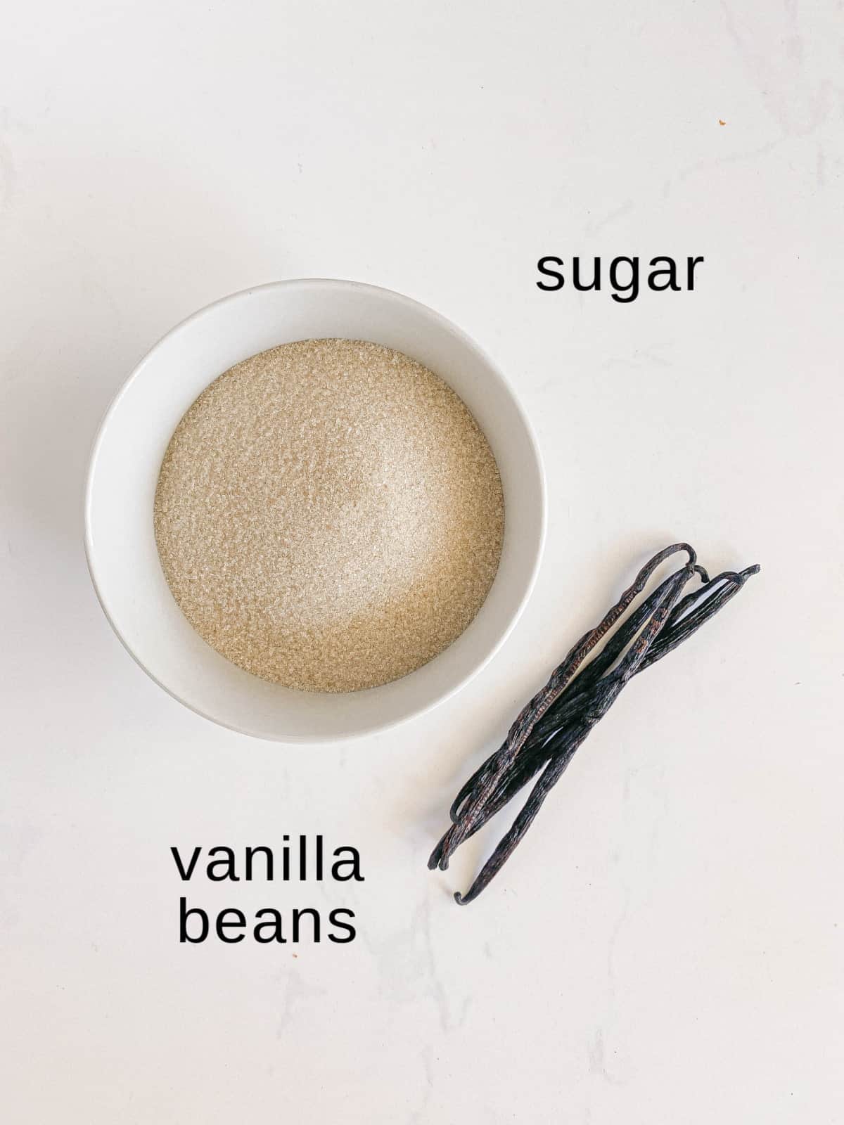 Vanilla Sugar ingredients on a white background.