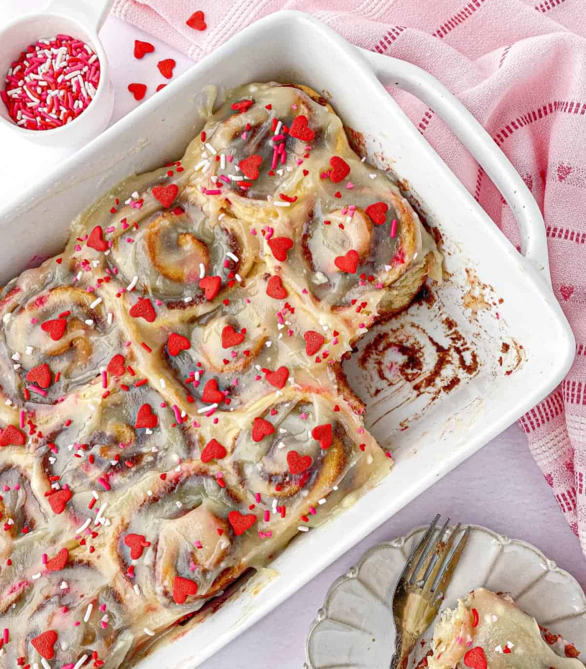 Top view of Funfetti Cinnamon Rolls with Valentine's Day Sprinkles on top.