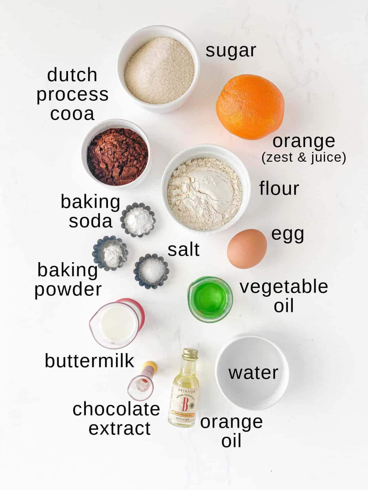 Chocolate Orange Cake ingredients on a white background.