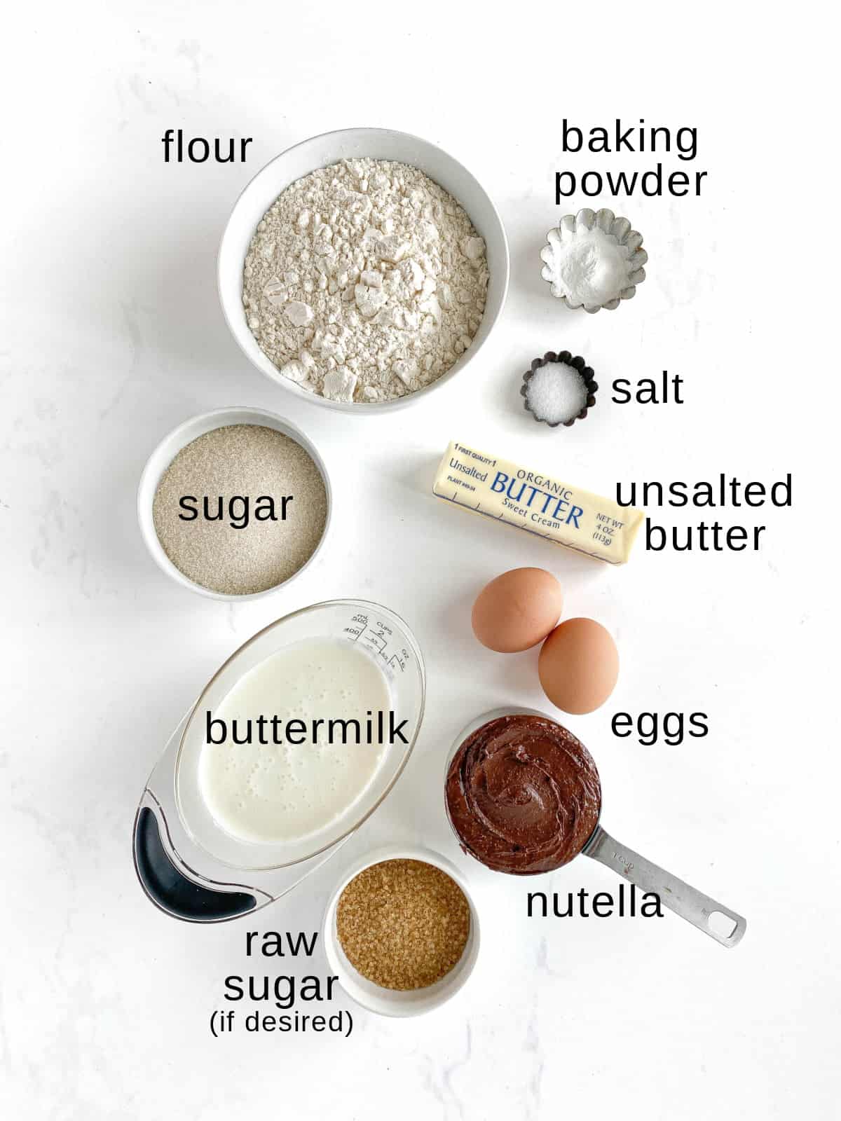 Nutella Muffins ingredients on a white background.