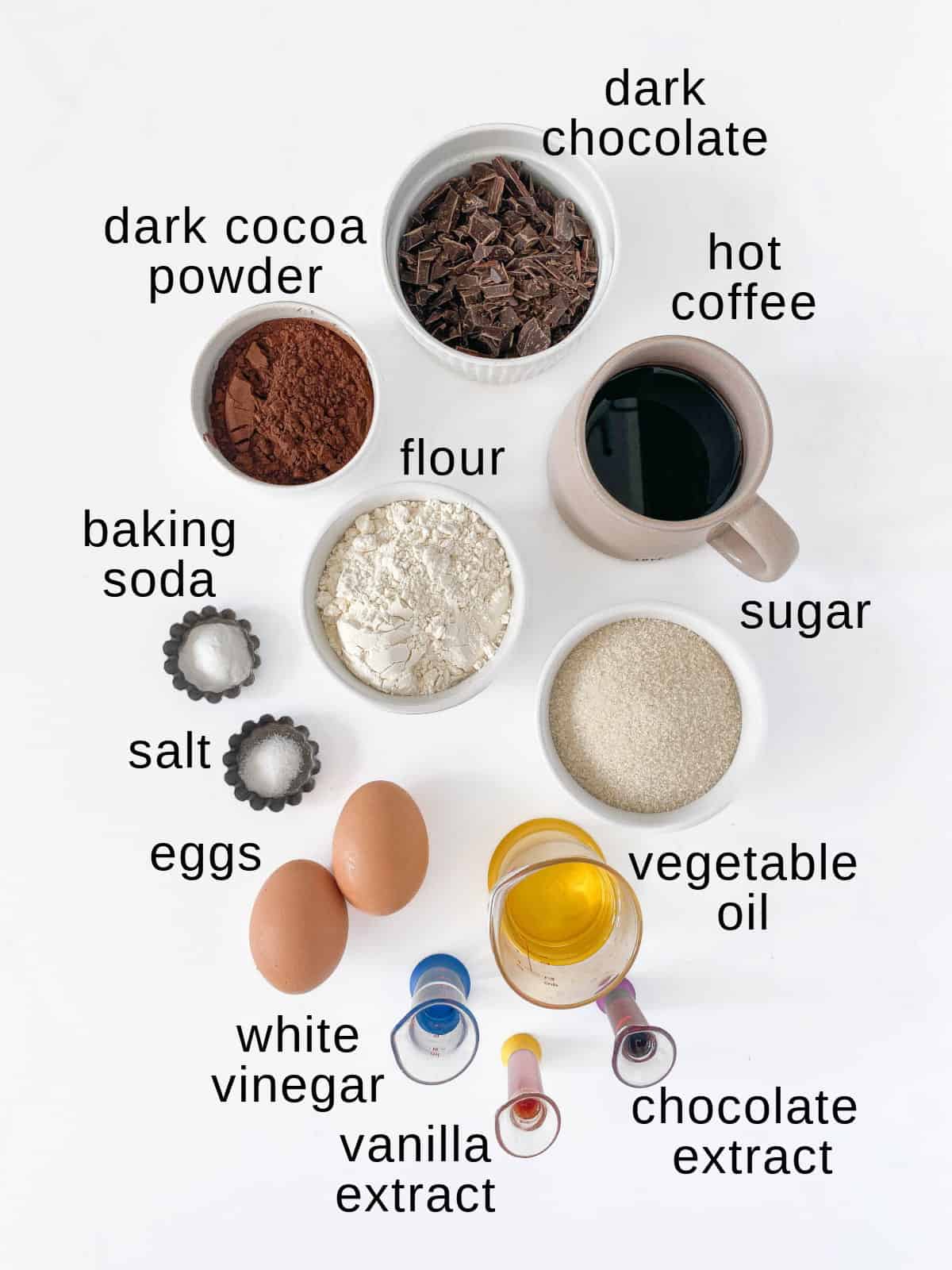 Chocolate cake ingredients on a white background.